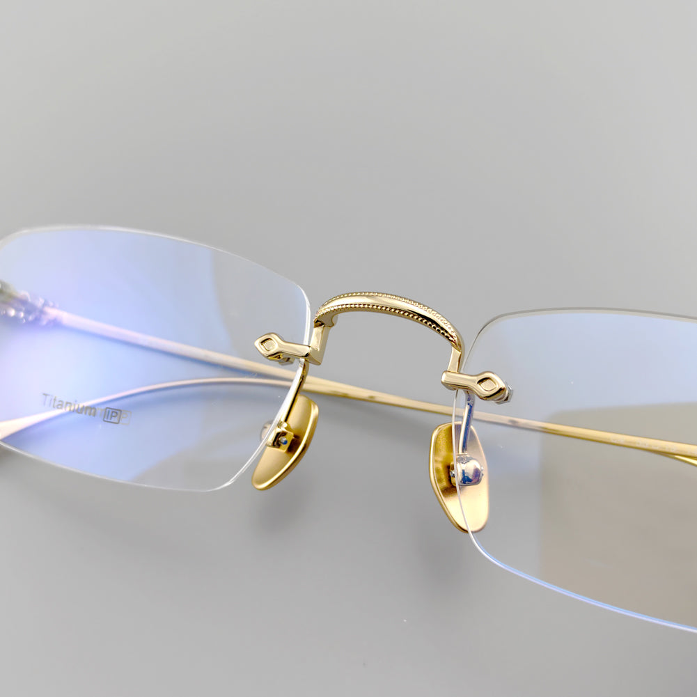 Designer Pure Titanium Rimless Eyeglasses - EO-637