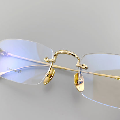 Designer Pure Titanium Rimless Eyeglasses - EO-637