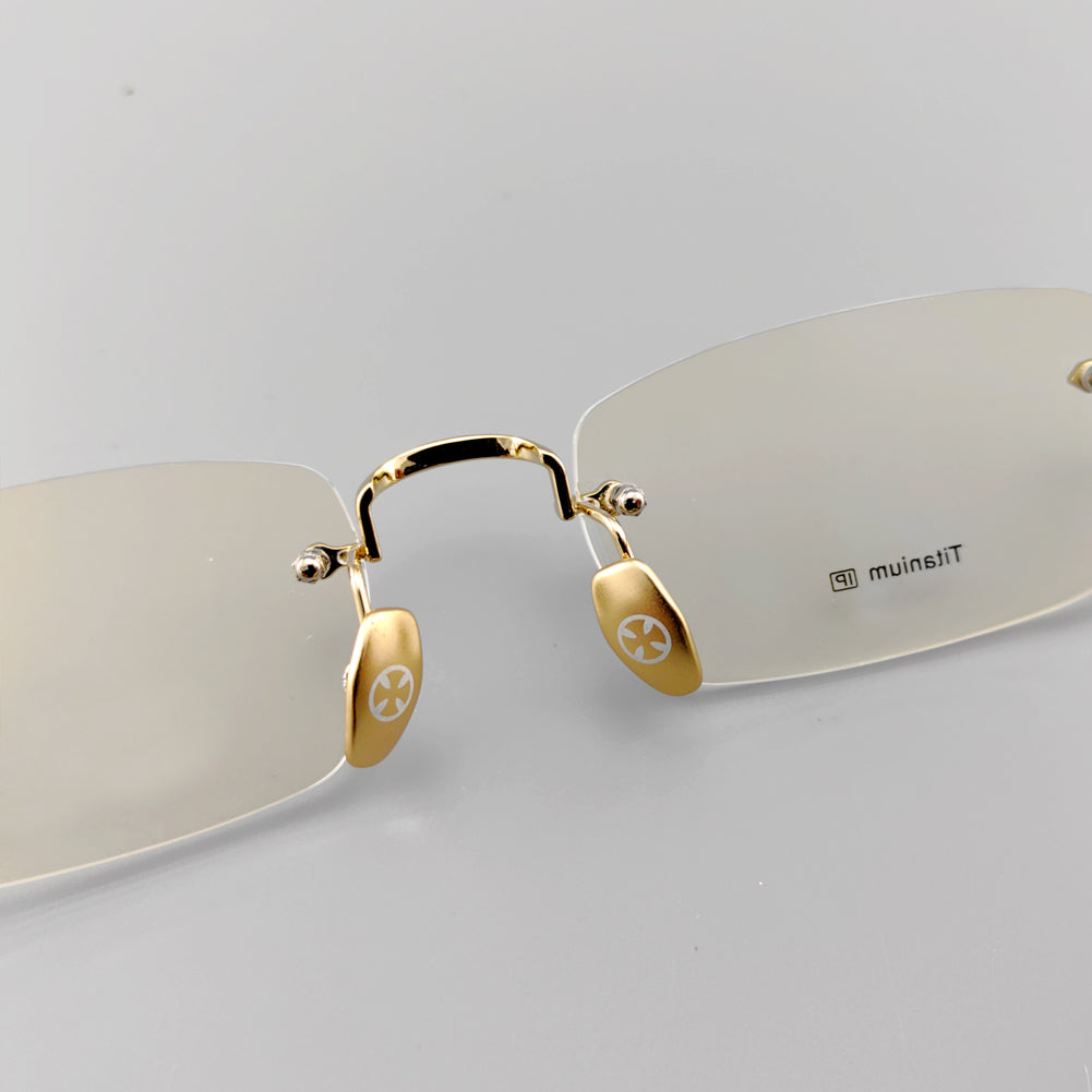 Designer Pure Titanium Rimless Eyeglasses - EO-637