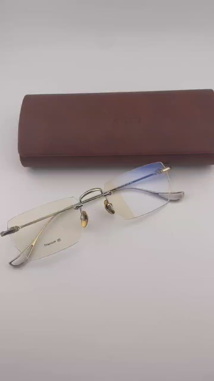 Designer Pure Titanium Rimless Eyeglasses - EO-637